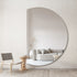 Modern artistic left cut mirror in living room