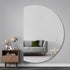 Artistic crescent mirror as a statement piece in a lounge