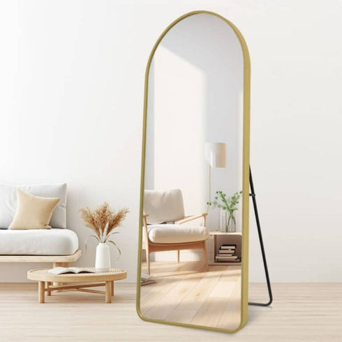 Side angle showing thickness of gold standing mirror