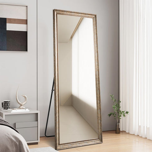 Florinelle Full-Length Bronze Frame Dressing Mirror in bedroom setting