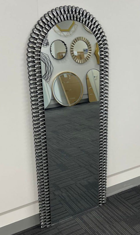 Full-length arched mirror with sculptural silver acrylic design