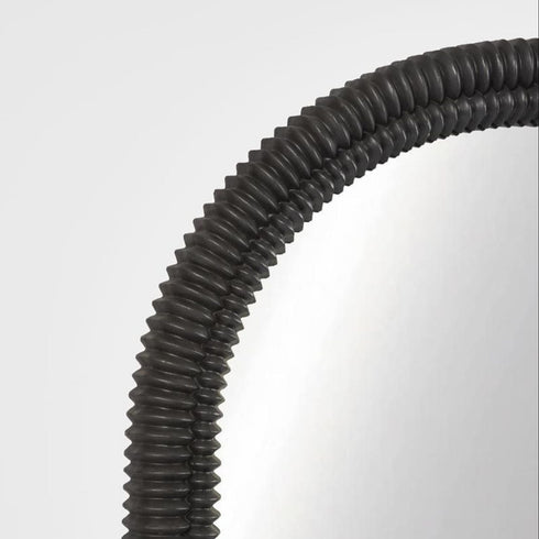 Side view of Flora Arched Black Mirror, 6.5cm depth, slim frame design