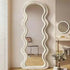 Plush teddy velvet wavy mirror in beige, perfect for hallways, bedrooms, and entryways