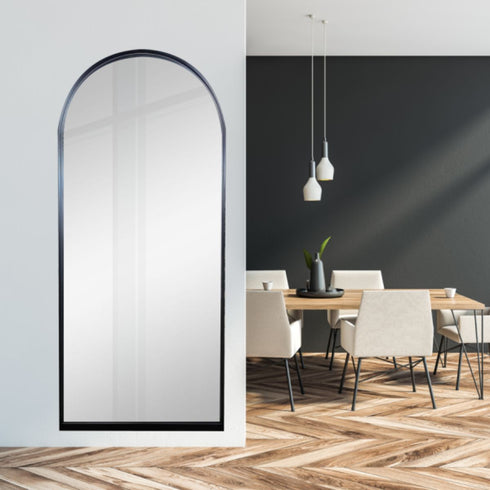 Foyer interior featuring Marika Arch Black Wall Mirror