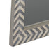 Close-up of Nalaya zebra fishbone frame showing brown and grey herringbone texture