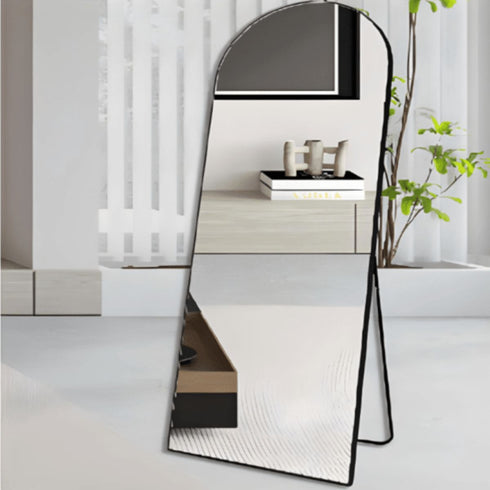 Sleek Coen freestanding mirror with black aluminium frame, perfect for bedrooms, entryways, or dressing areas