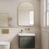 Stylish 80x100cm gold arched mirror mounted in a bathroom