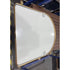Back view of gold arched wall mirror showing wall-mounting hardware