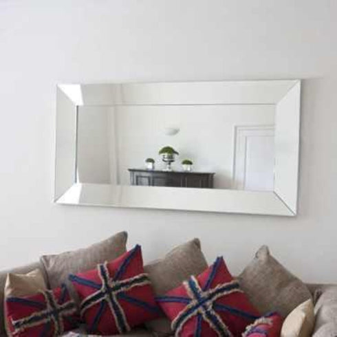 Tall Maddox silver floor mirror styled in a bedroom