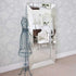 Maddox modern silver wall mirror displayed above a console table
