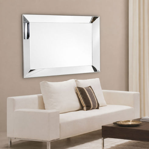 Maddox modern silver rectangular wall mirror above a sofa