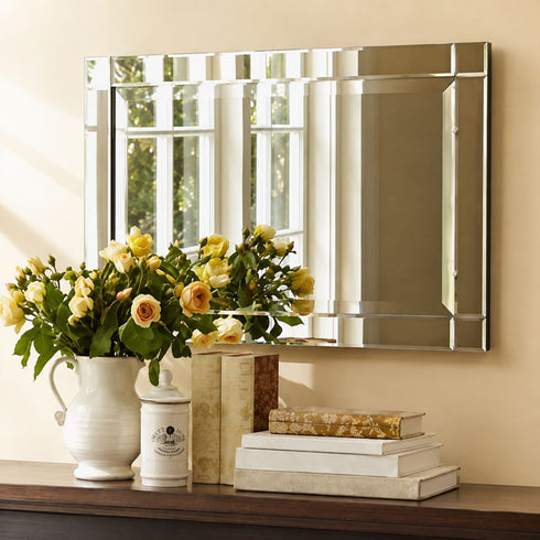 Maddox modern silver wall mirror displayed above a console table