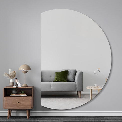 Artistic crescent mirror as a statement piece in a lounge