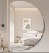 Wall-mounted Meira crescent mirror with minimalist decor